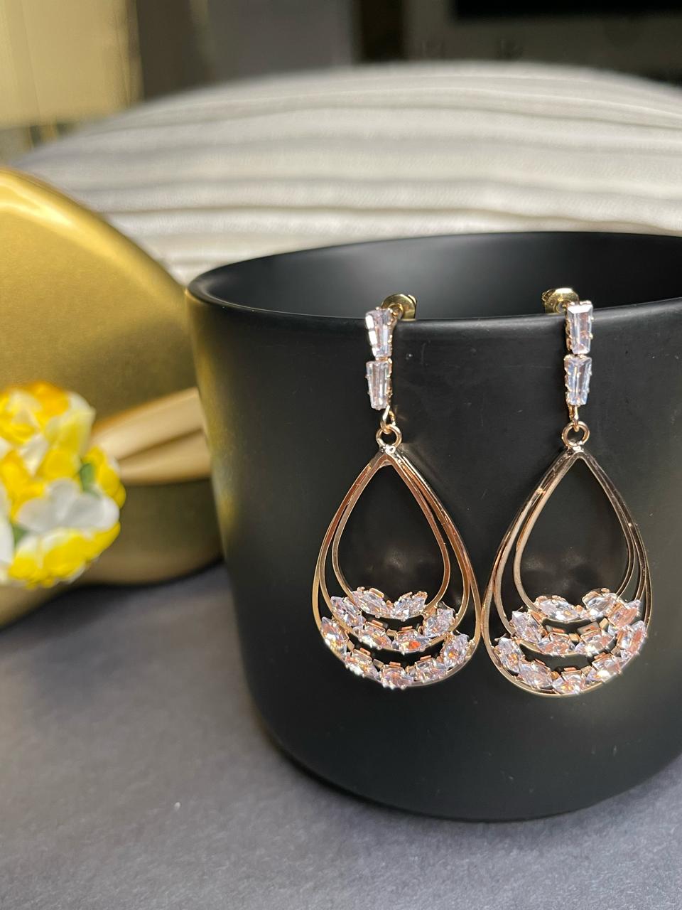 The luxurious fashion designer traditional gold plated American diamond earrings