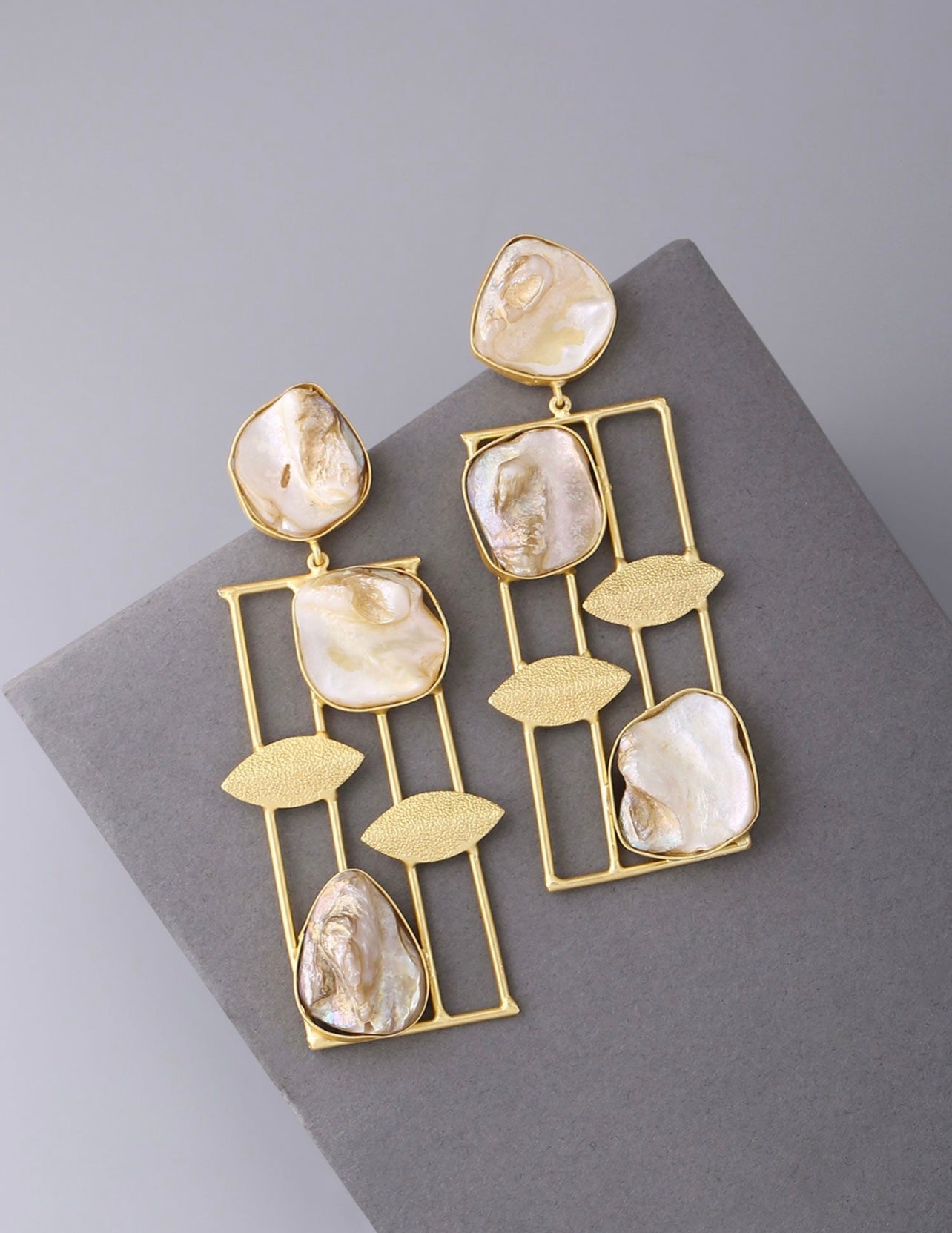 Gold plated mother of pearl dangler earrings for women