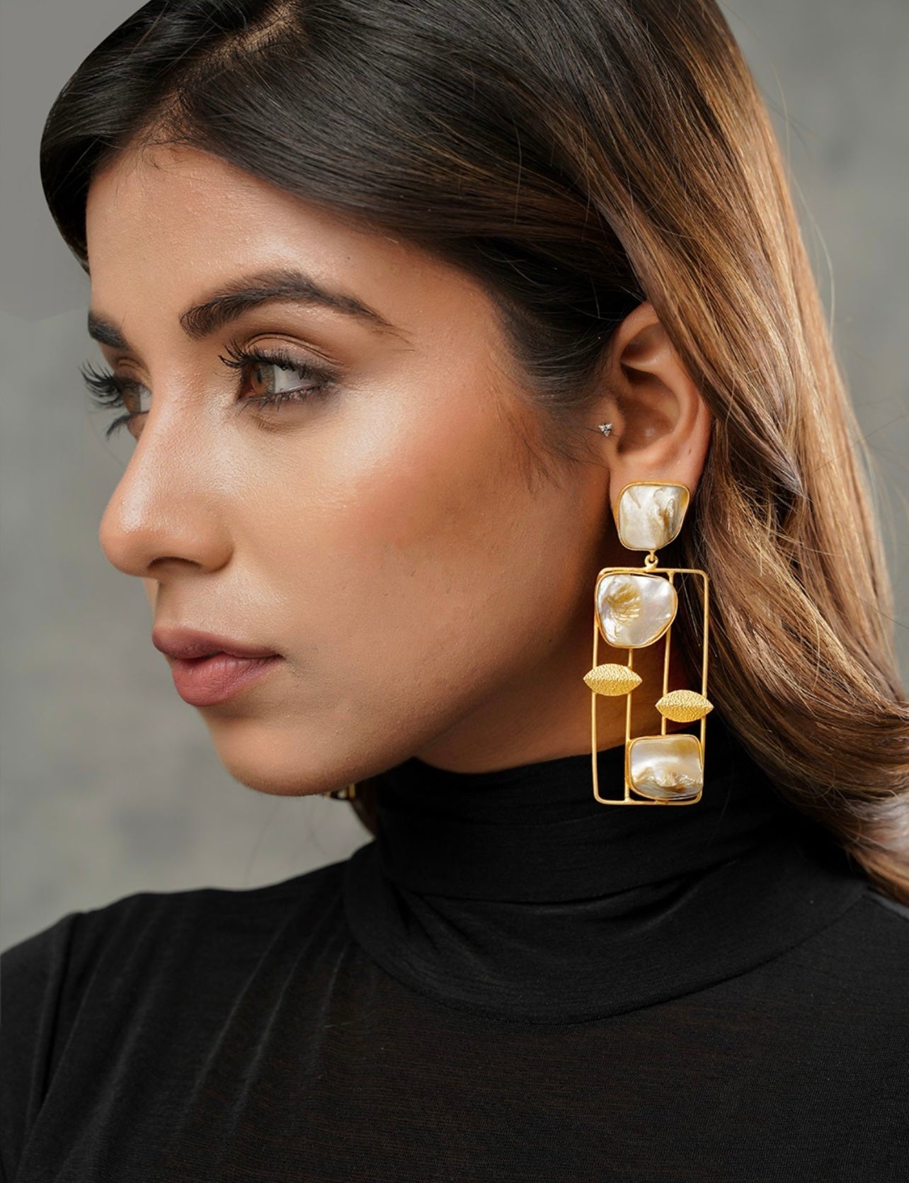 Gold plated mother of pearl dangler earrings for women